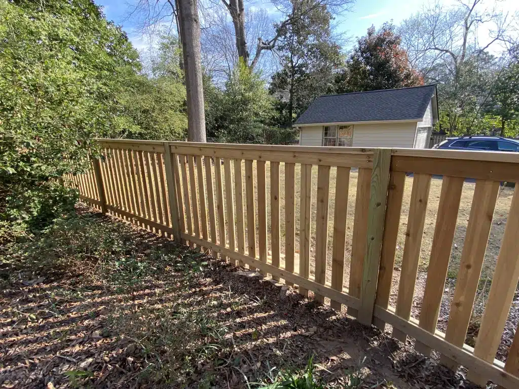 expert wood fence installation in Atlanta backyard setting