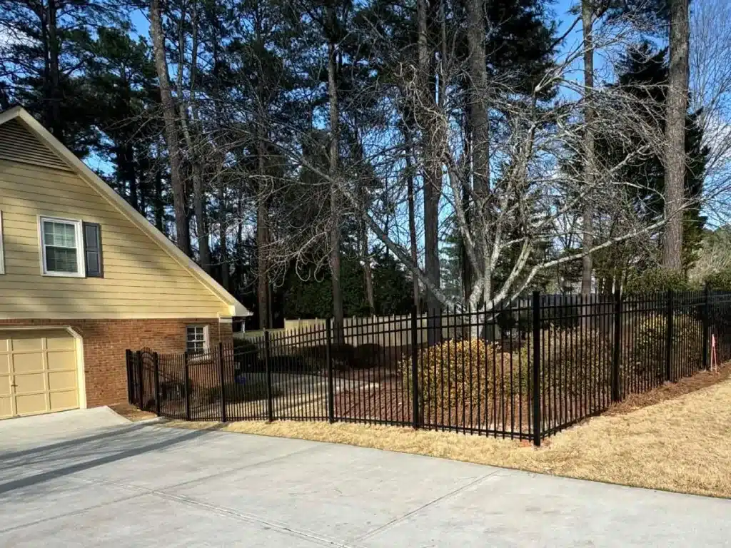 black aluminum fence installation in Alpharetta Georgia