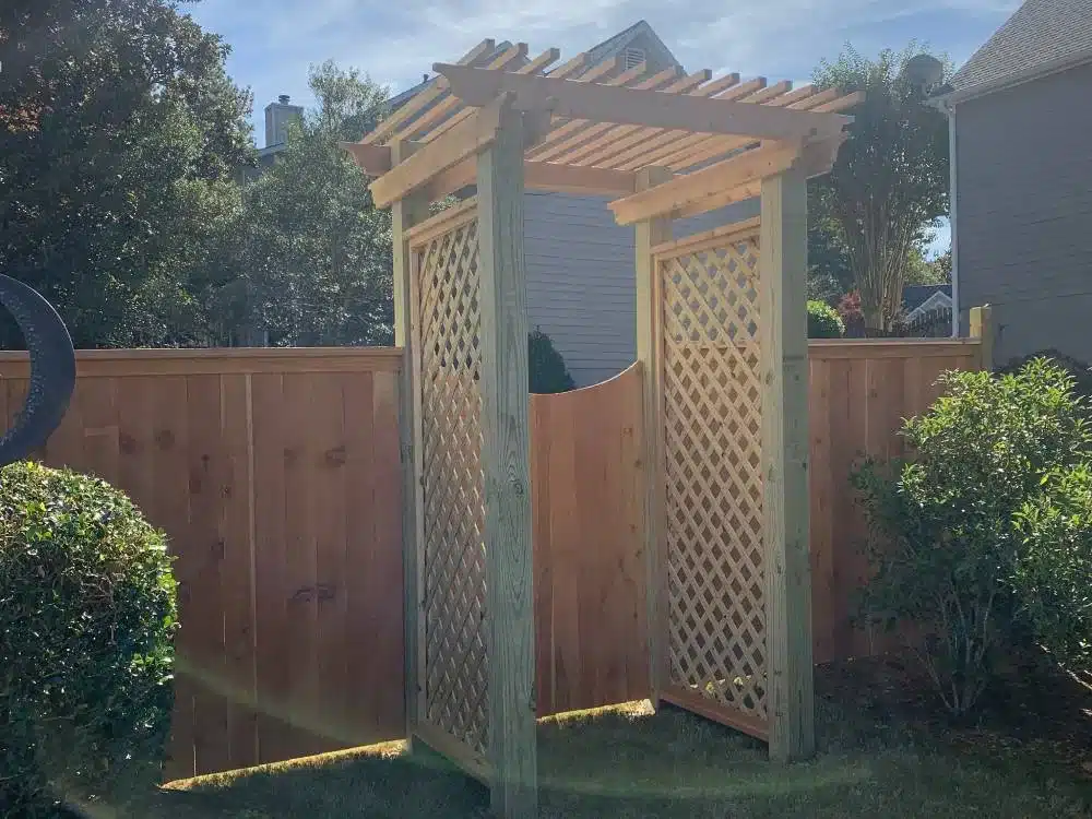 Decorative wood fence, arbor, and gate in Alpharetta Georgia
