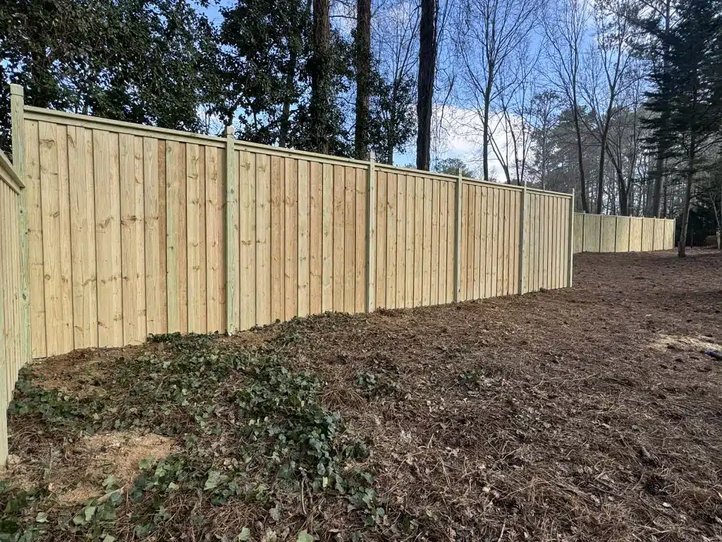 wooden privacy fence installed in a backyard in Kennesaw Georgia